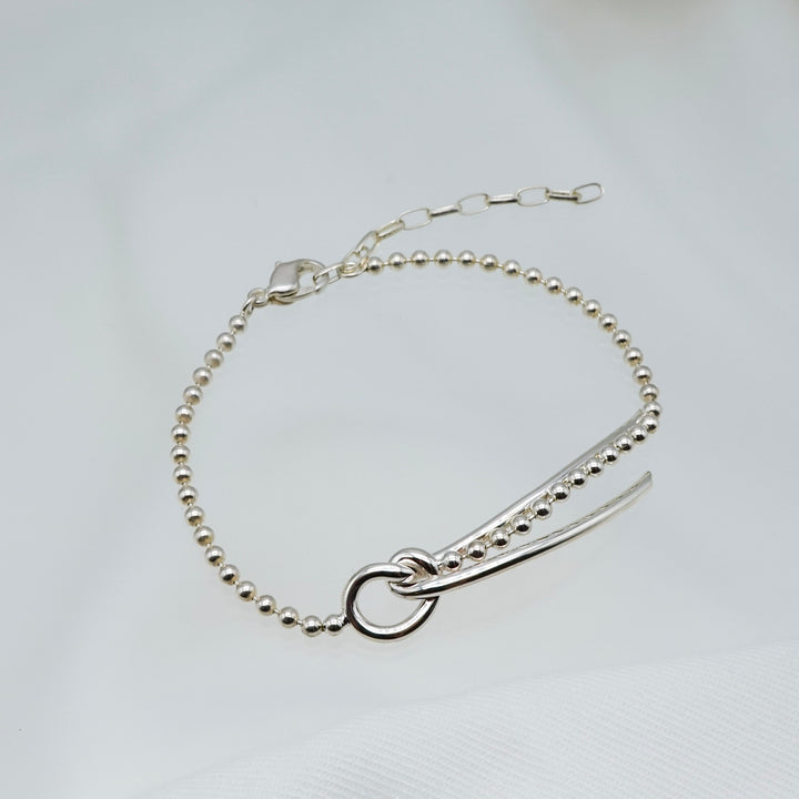 THREADS Silver Bow Tie Bracelet