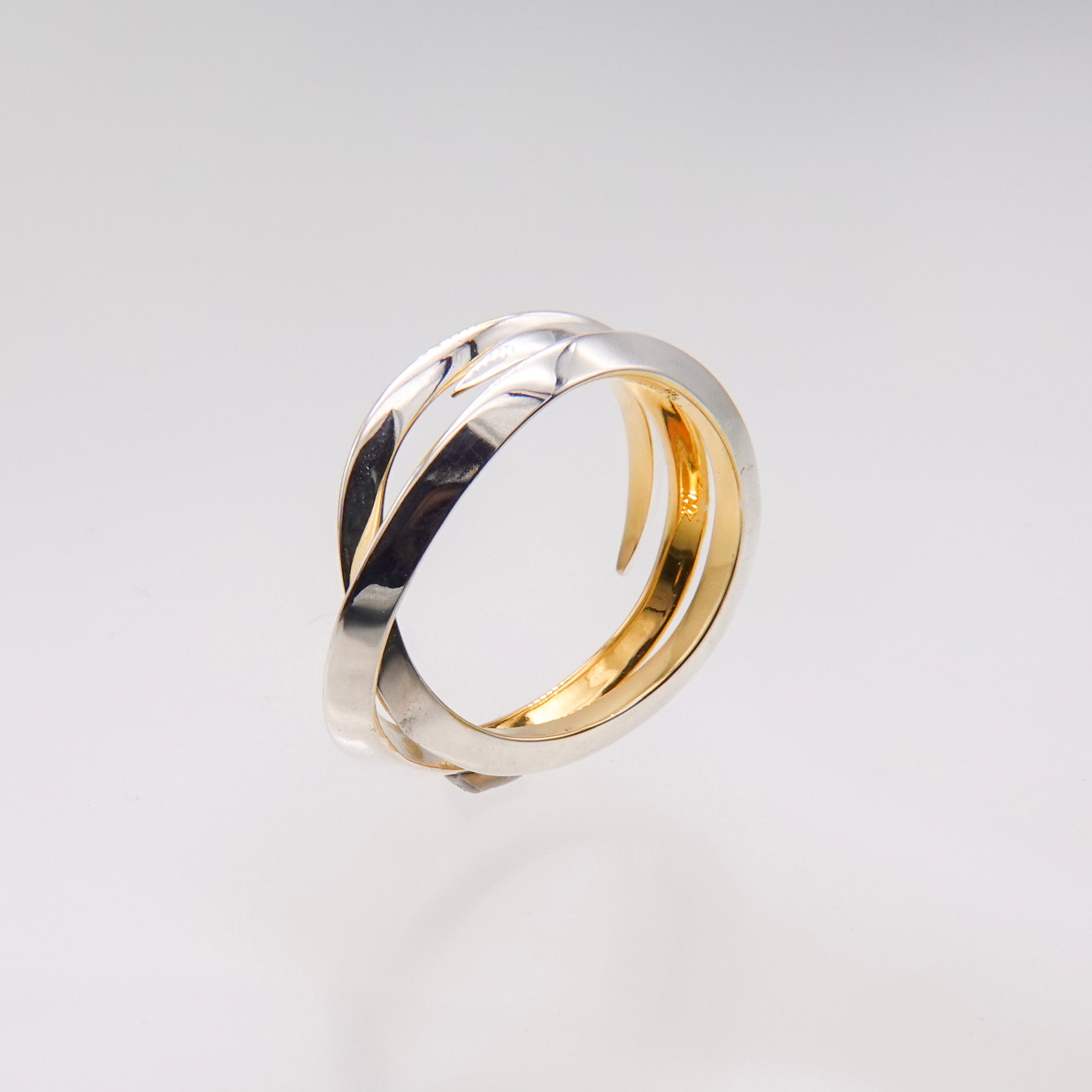 triangle irregular twist ring – unigem