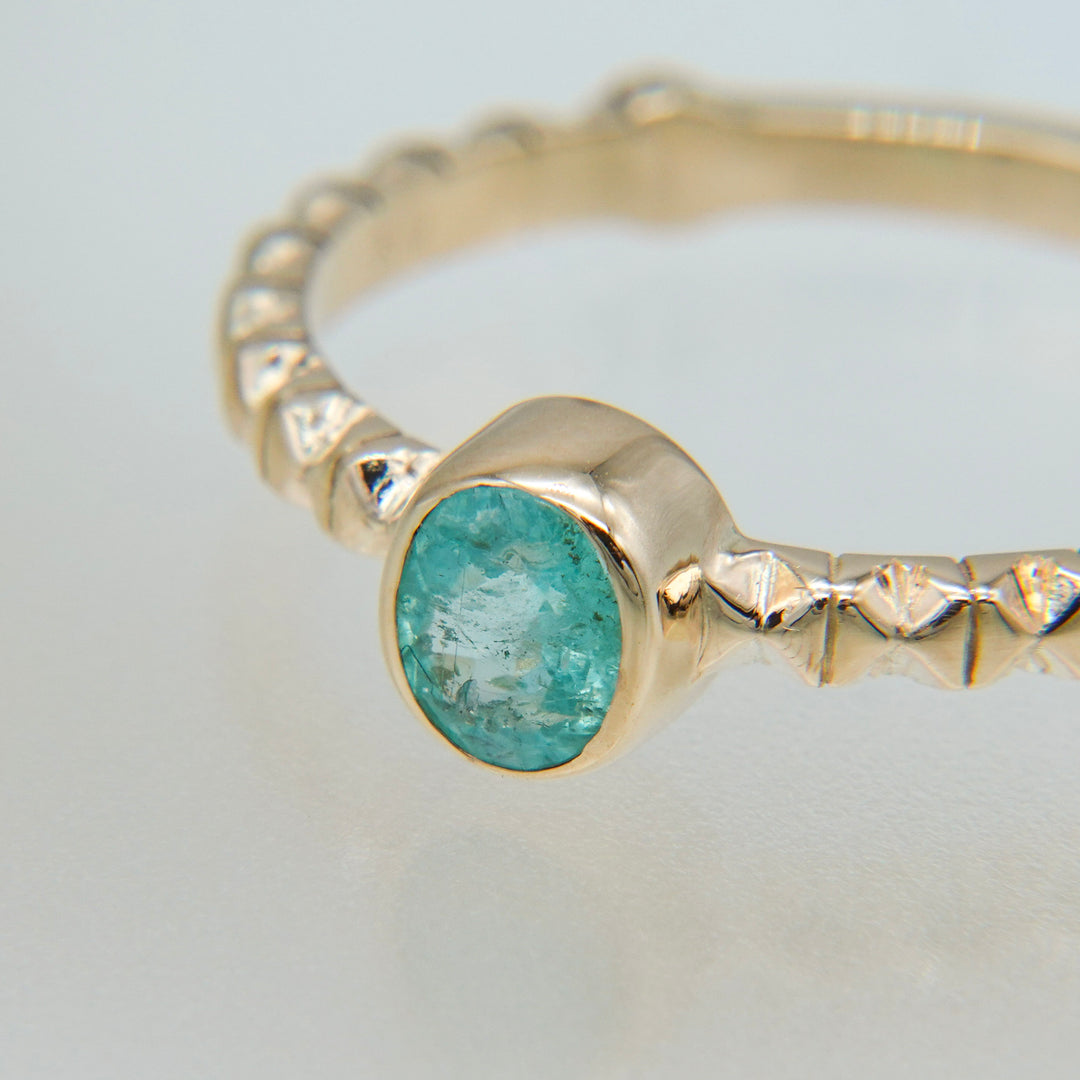 K10パライバトルマリンフィレンツェ彫りリング