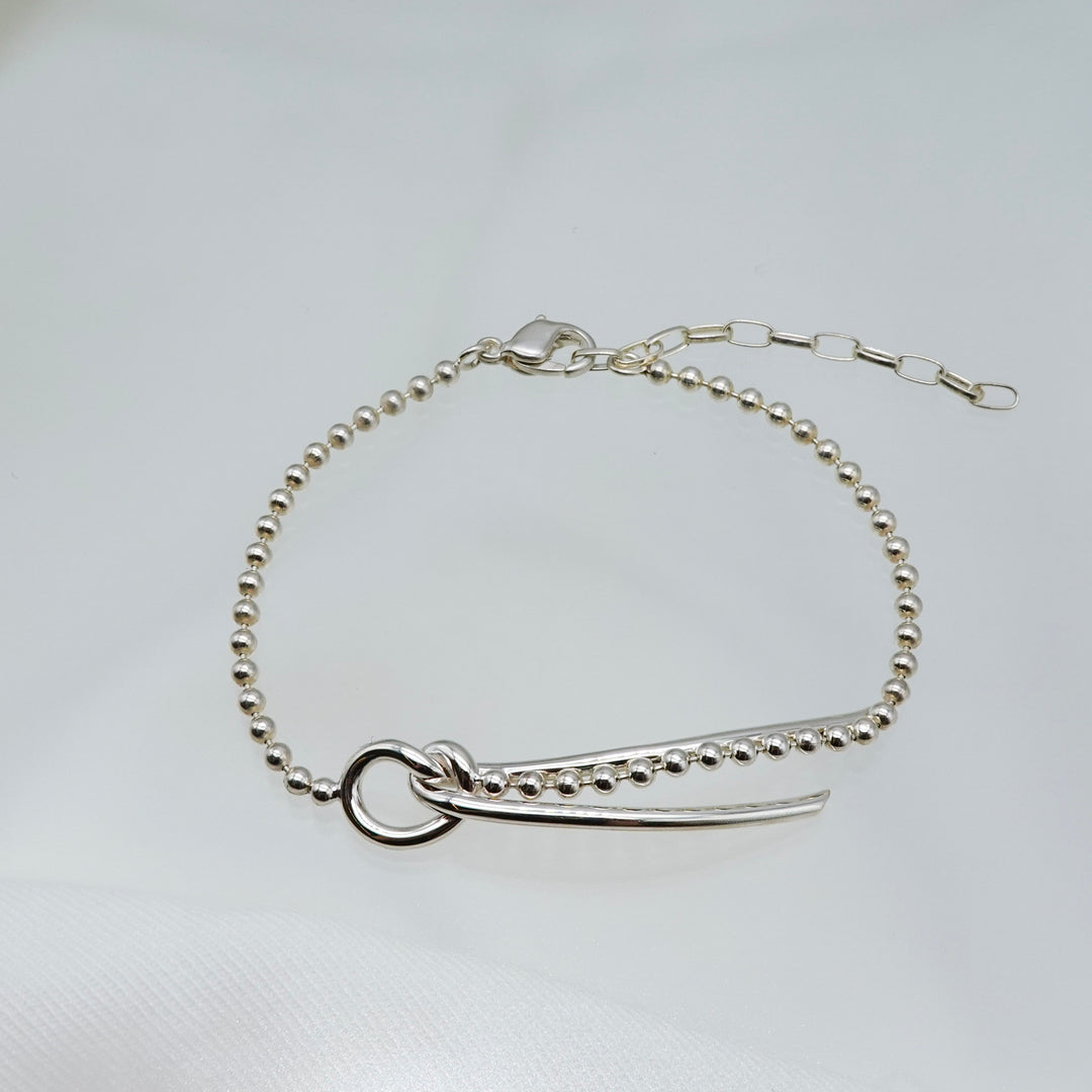 THREADS Silver Bow Tie Bracelet