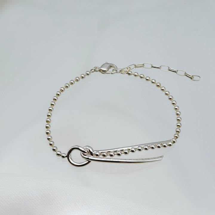 THREADS Silver Bow Tie Bracelet