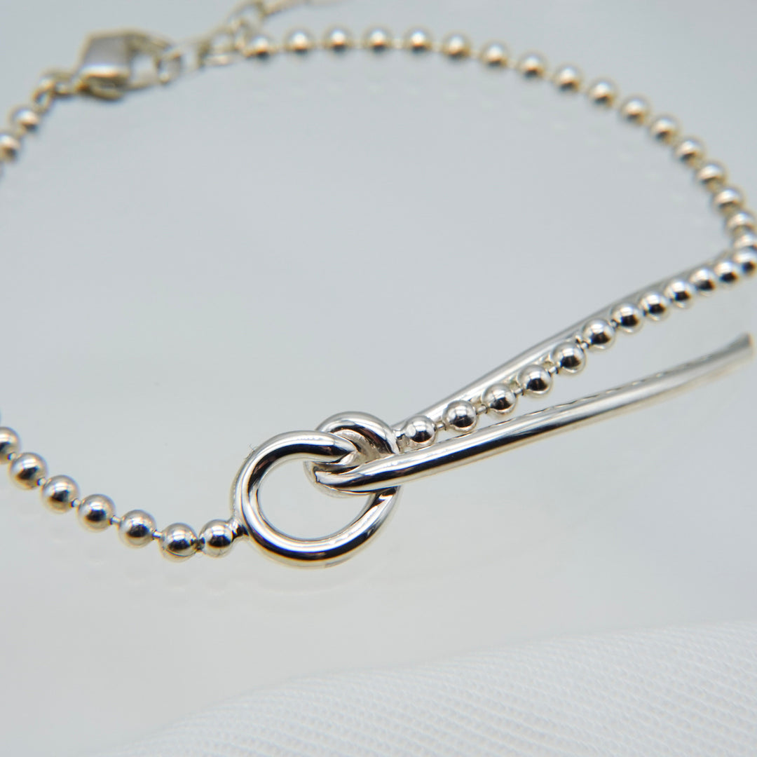 THREADS Silver Bow Tie Bracelet