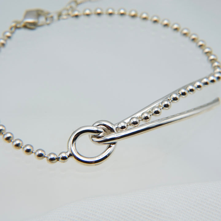THREADS Silver Bow Tie Bracelet