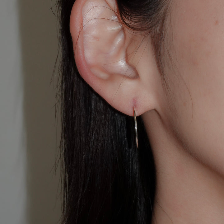 DISC pierced earring