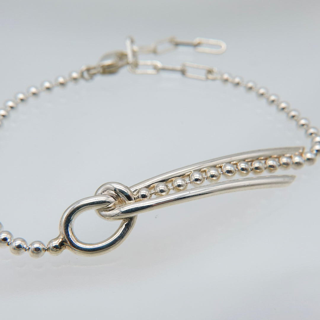 THREADS Silver Bow Tie Bracelet