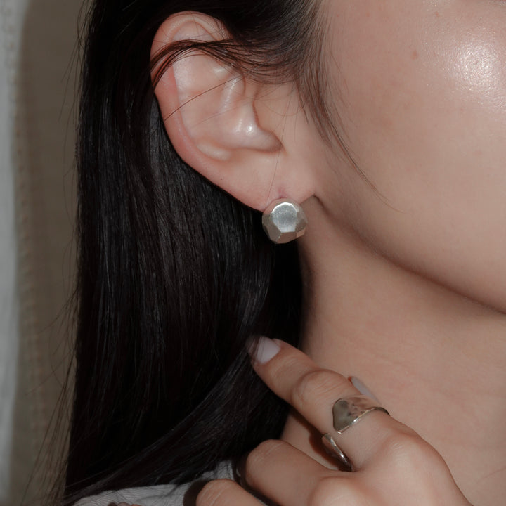 Neutral M pierced earring