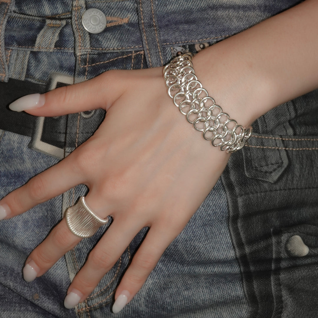 Stacked silver ring design bracelet