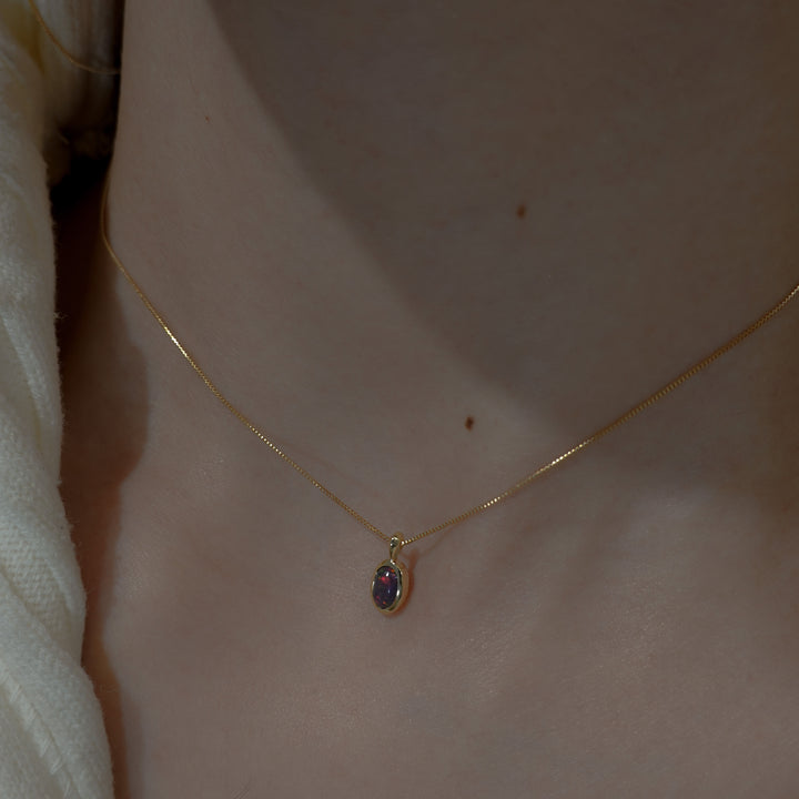 petit amulet necklace (18KYG x black opal)