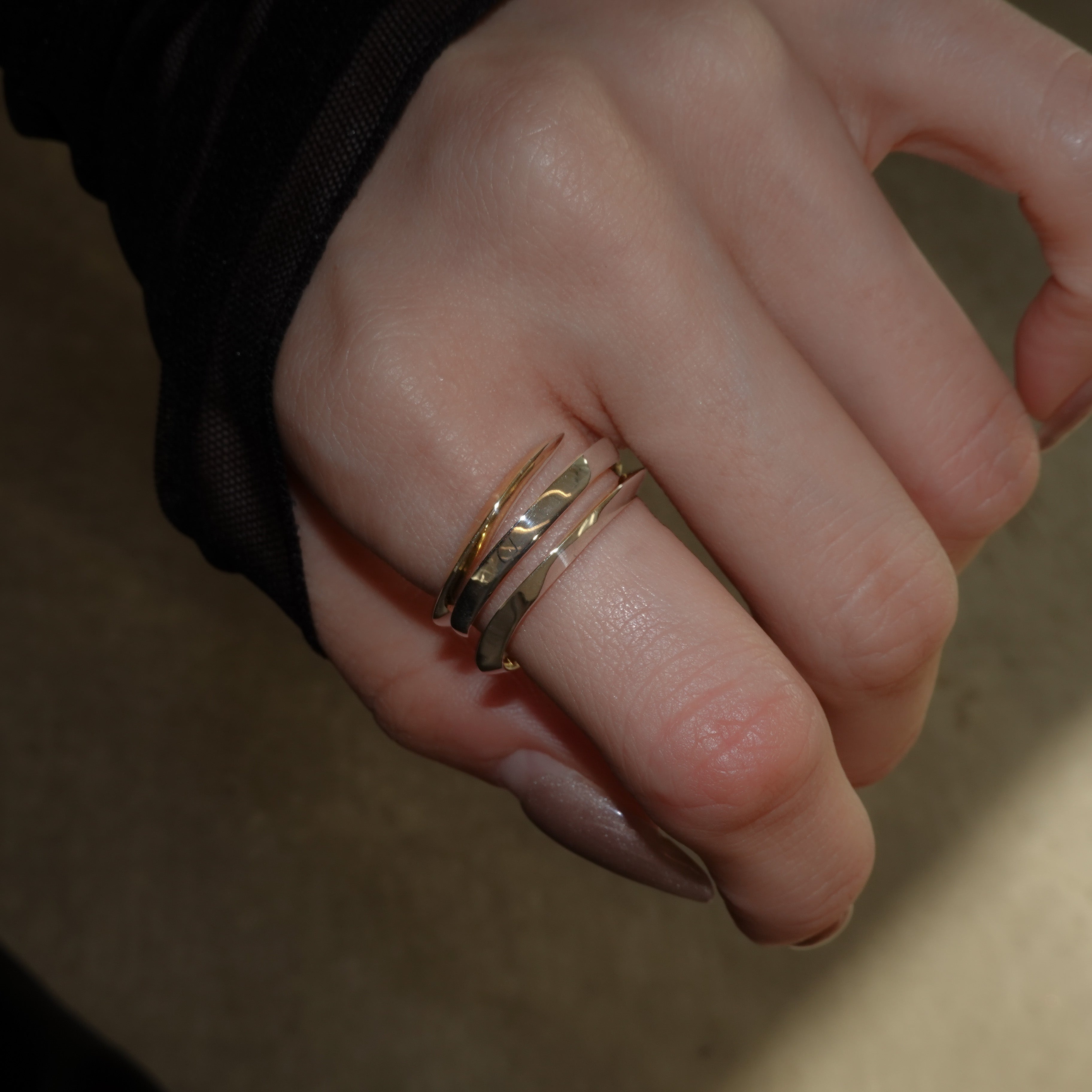 triangle irregular twist ring – unigem