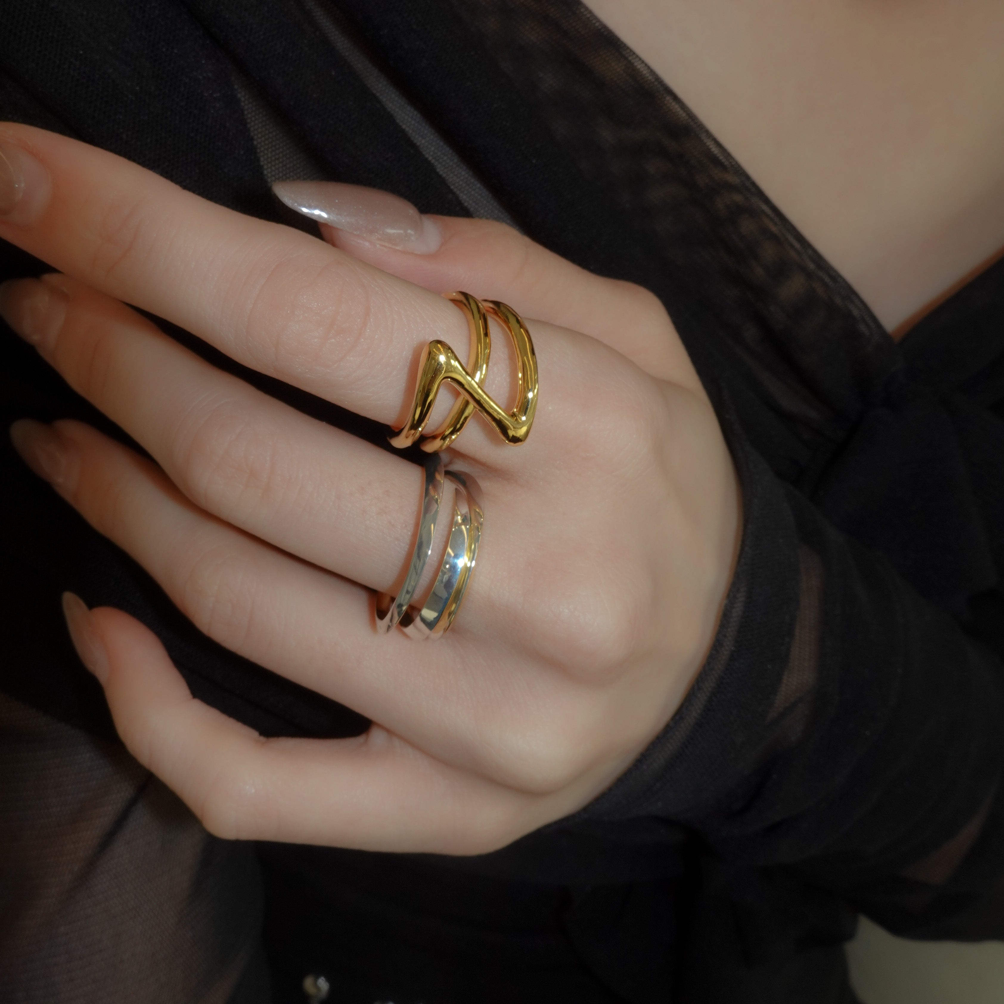 triangle irregular twist ring – unigem