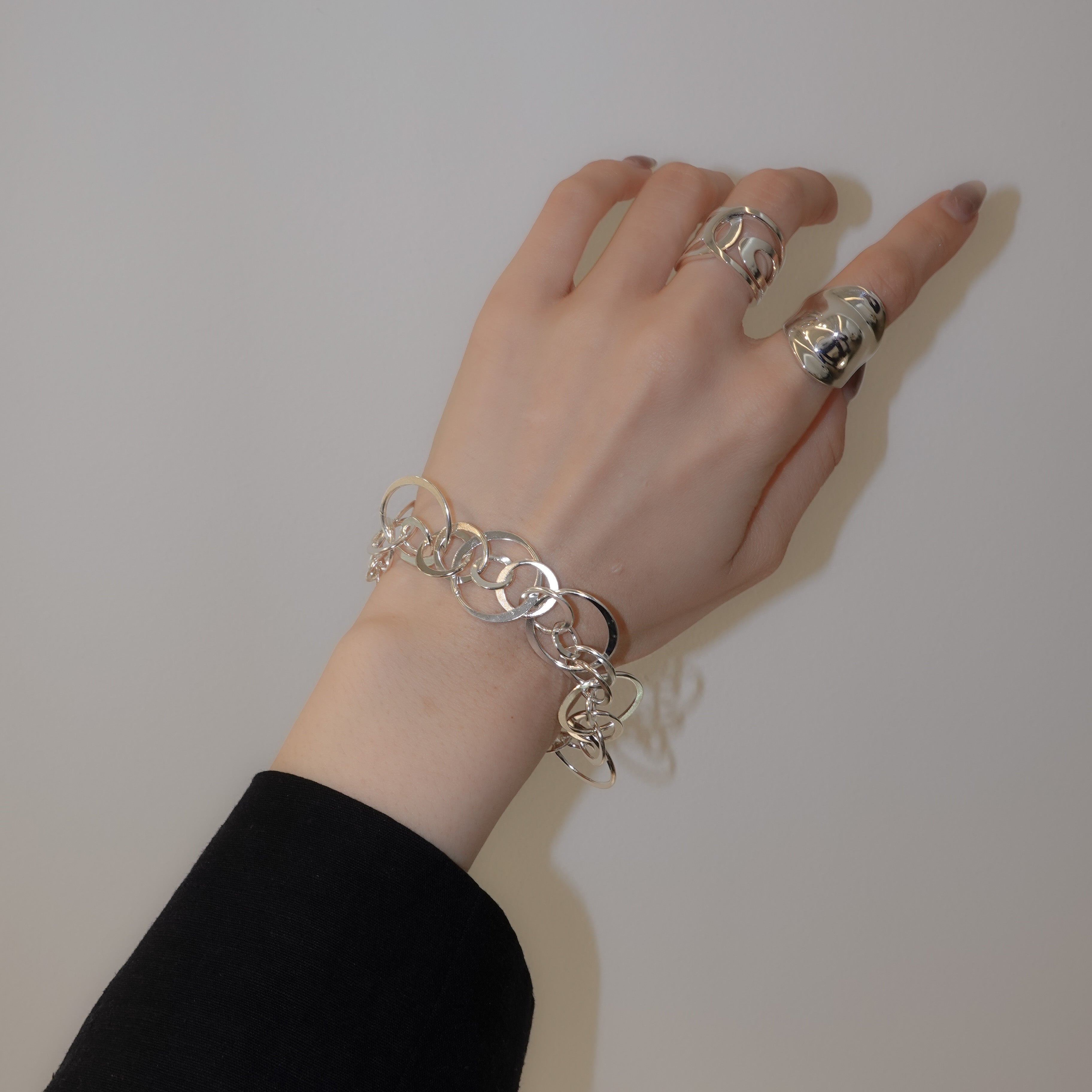 genome motif bracelet with simple parts intricately intertwined