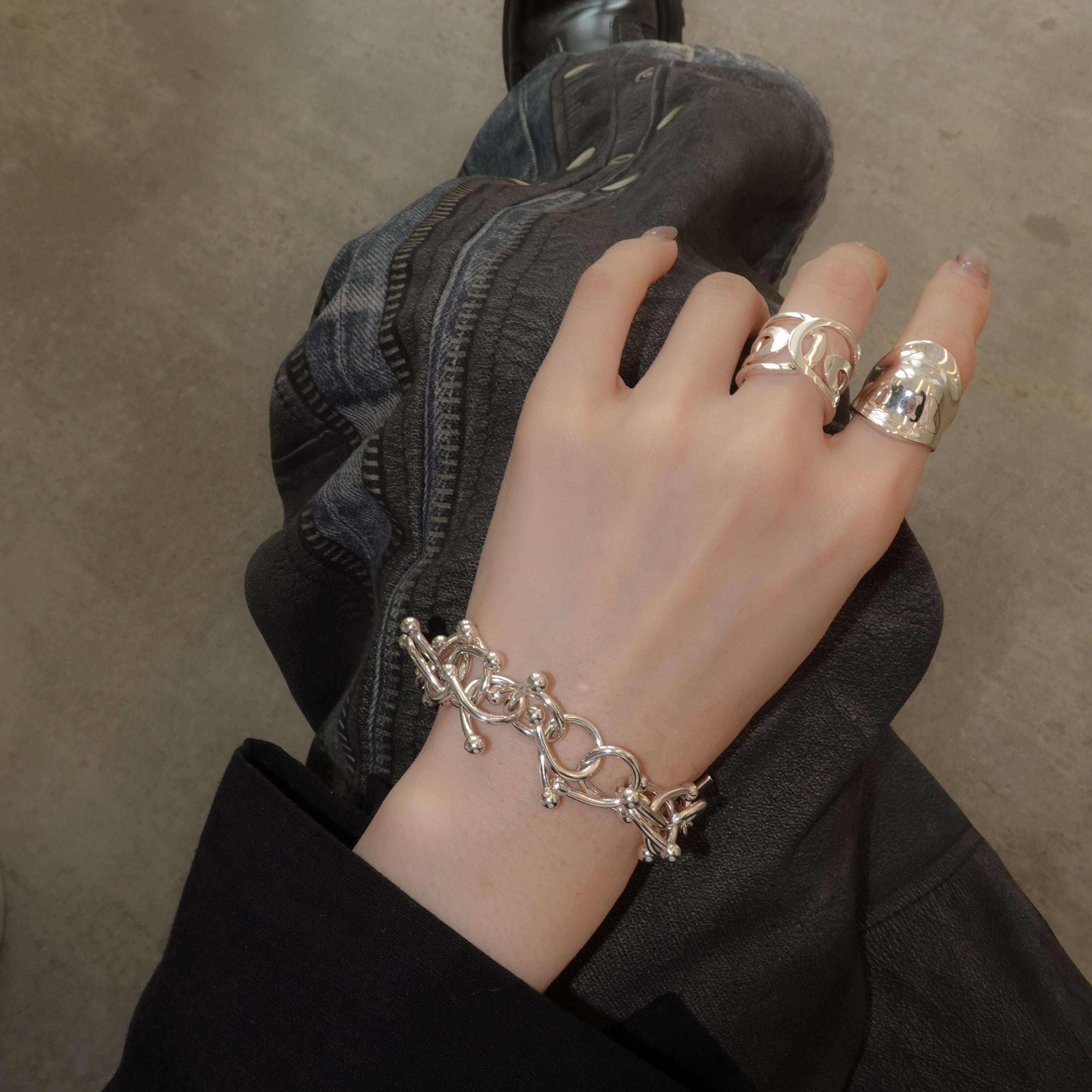 genome motif bracelet with simple parts intricately intertwined
