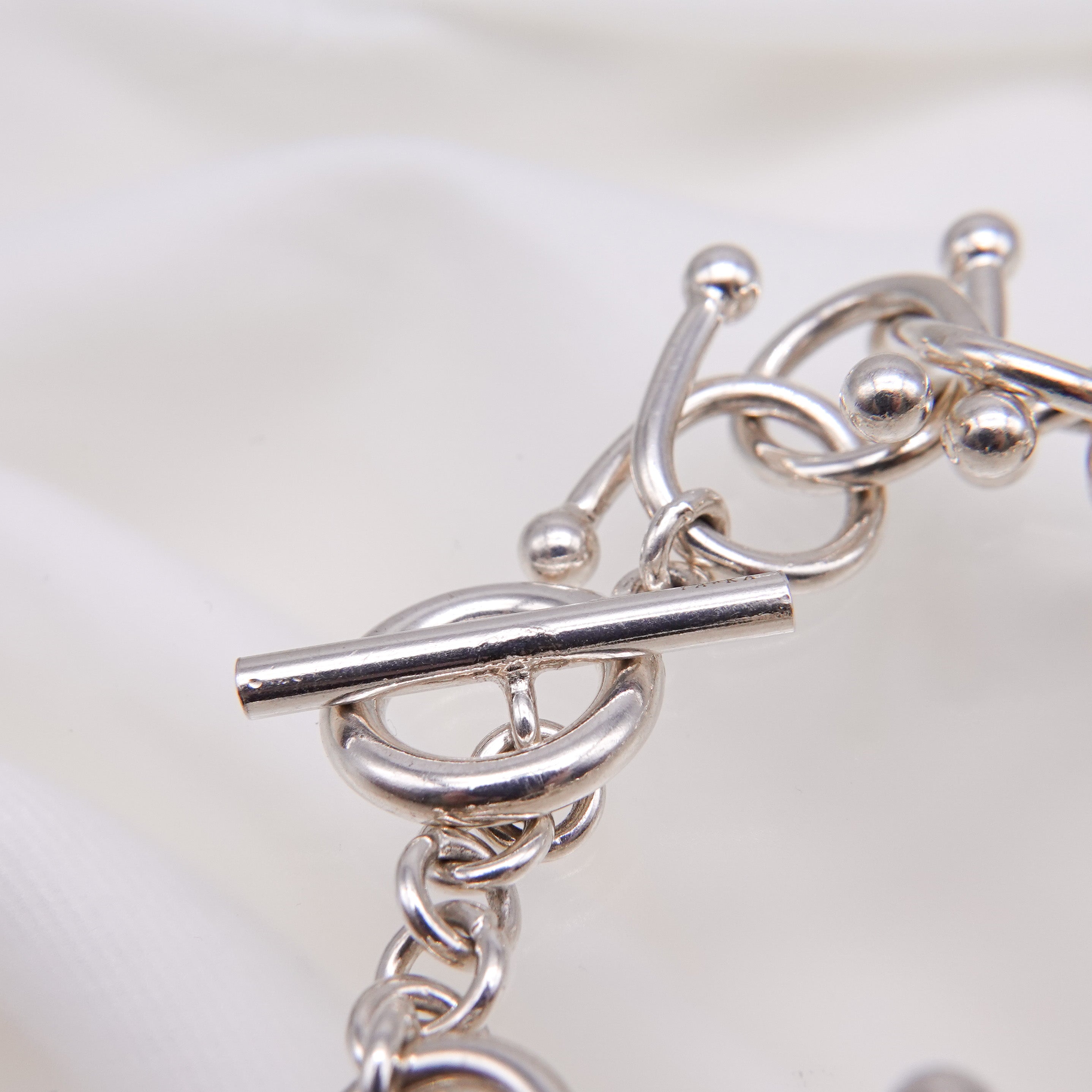 genome motif bracelet with simple parts intricately intertwined