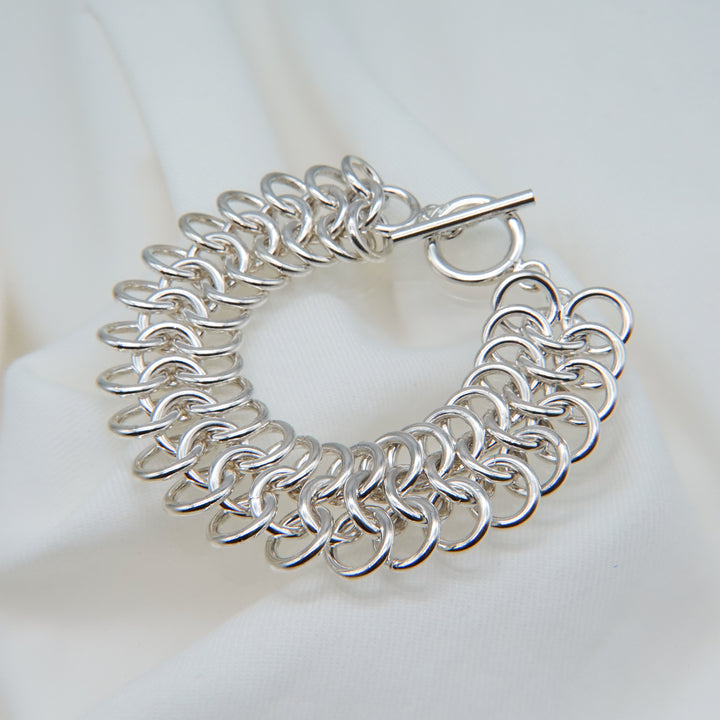 Stacked silver ring design bracelet