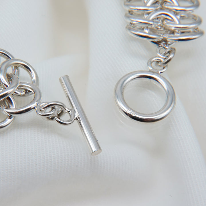 Stacked silver ring design bracelet