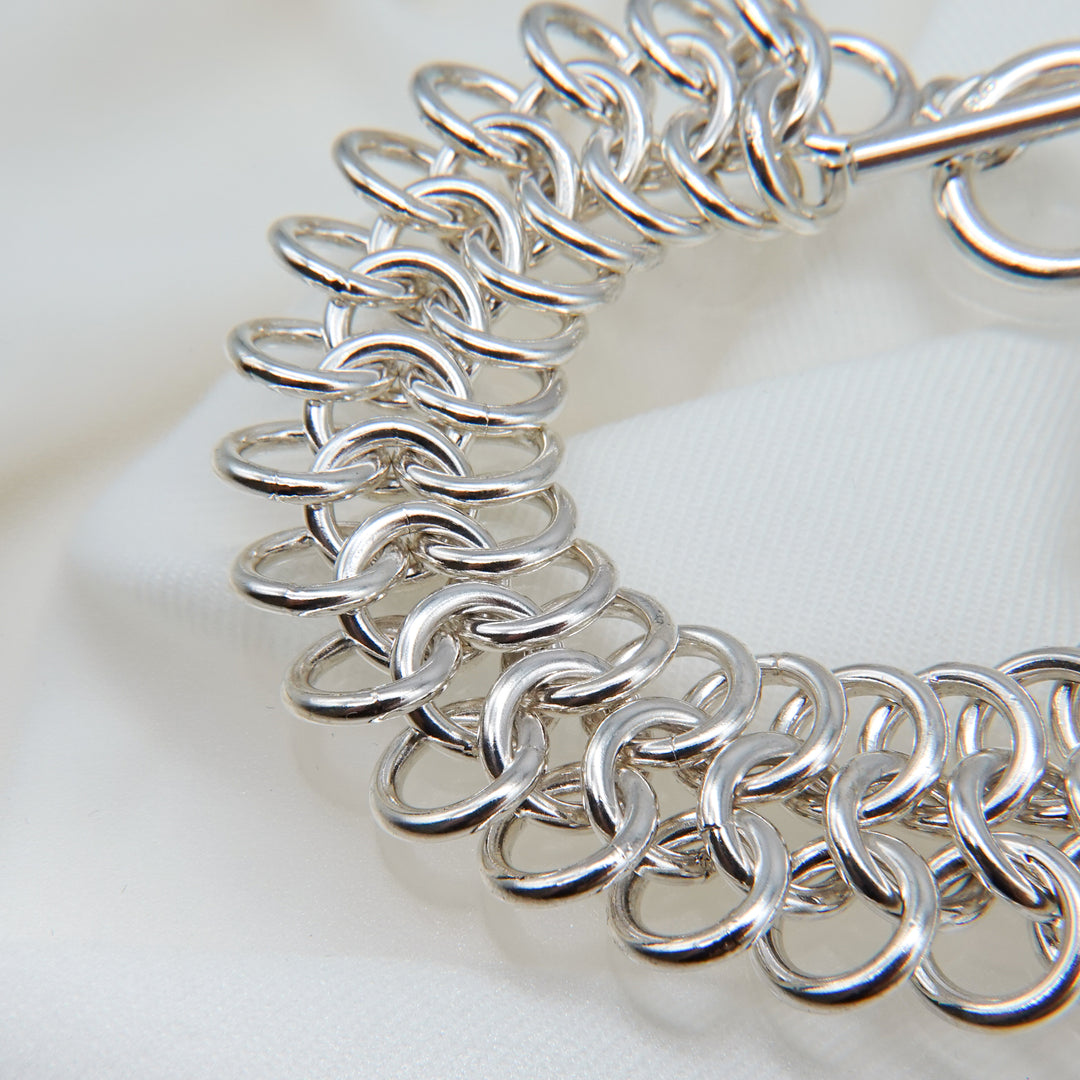 Stacked silver ring design bracelet