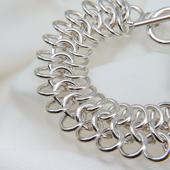 Stacked silver ring design bracelet