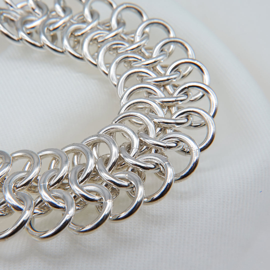 Stacked silver ring design bracelet
